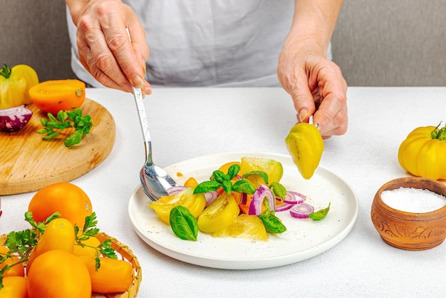 Chef preparing a colorful dish in a modern kitchen