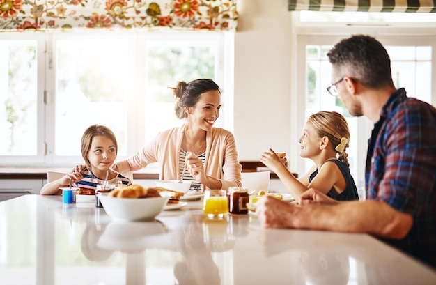 Happy family eating at home